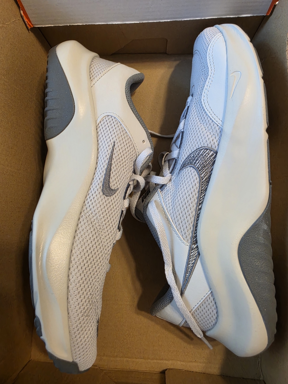 Nike Women’s White and Gray Mesh Athletic Sneakers